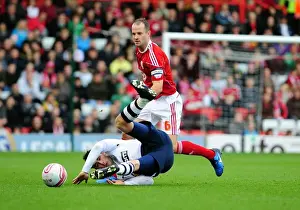Bristol City's Louis Carey Tackles Keith Treacy in Intense Championship Clash at Ashton Gate Stadium (06/11/2010)