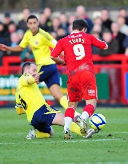 Images Dated 7th January 2012: Bristol City's Louis Carey Tackles Matt Tubbs of Crawley Town in FA Cup Clash - 07/01/2012