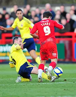 Crawley Town V Bristol City Prints: Bristol City's Louis Carey Tackles Matt Tubbs of Crawley Town in FA Cup Clash - 07/01/2012