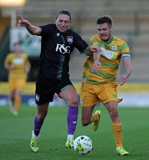 Images Dated 30th July 2015: Bristol City's Luke Ayling Tackles Yeovil Town's Ryan Dickson in Pre-Season Clash