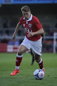Weston V Bristol City Prints: Bristol City's Luke Freeman Celebrates Pre-Season Win with Trophy at Woodspring Stadium