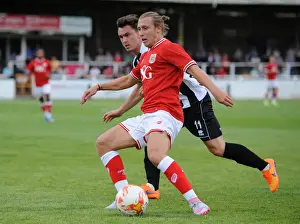Pre Season Prints: Bristol City's Luke Freeman Faces Off Against Bath City's Ash Kington in Pre-Season Friendly