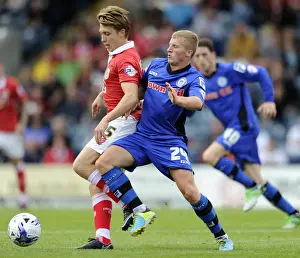 Rochdale V Bristol City Prints: Bristol City's Luke Freeman Faces Off Against Rochdale's Jamie Allen in Sky Bet League One Clash