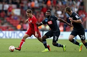 Images Dated 17th September 2016: Bristol City's Luke Freeman Outmaneuvers Darren Bent of Derby County during Sky Bet Championship