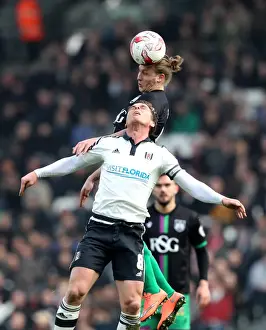 Craven Cottage Prints: Bristol City's Luke Freeman Outmuscles Fulham's Scott Parker for a Header in Sky Bet Championship Clash