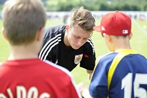 Images Dated 5th July 2014: Bristol City's Luke Freeman Signs Autographs at Portishead Town Pre-Season Friendly