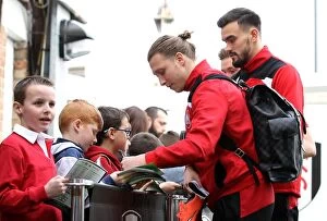 Images Dated 12th March 2016: Bristol City's Luke Freeman Signs Autographs at Craven Cottage after Fulham Match