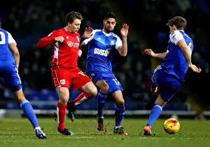 Ipswich Town V Bristol City Prints: Bristol City's Luke Freeman Tackles Ipswich Town's Christophe Berra in Championship Clash