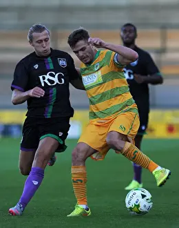 Yeovil Town V Bristol City Prints: Bristol City's Luke Freeman Tackles Yeovil Town's Ryan Dickson in Pre-Season Clash