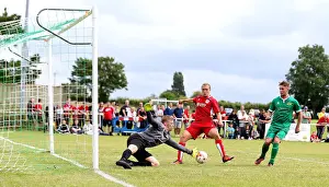 The Grove Prints: Bristol City's Luke Freeman Thwarted by Hengrove Athletic's Tom Kington in Pre-Season Friendly