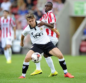 Pre Season Prints: Bristol City's Luke Freeman vs. Omari Sterling-James: A Tight Midfield Battle (2014)