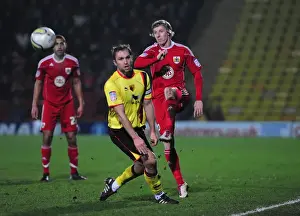 Bristol City's Martyn Woolford Clears the Ball at Vicarage Road Stadium