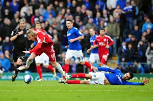 Portsmouth V Bristol City Prints: Bristol City's Martyn Woolford Fouled by Portsmouth's Ricardo Rocha During Match