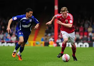 Framed Print : Bristol City's Martyn Woolford Outsmarts Carlos Edwards in Championship Showdown at Ashton Gate Stadium (16-04-2011) Framed Print : Bristol City's Martyn Woolford Outsmarts Carlos Edwards in Championship Showdown at Ashton Gate Stadium (16-04-2011)