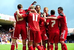 Bristol City v Cardiff City Collection: Bristol City's Martyn Woolford Scores Double: Celebration with Team Mates vs Cardiff City