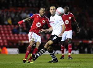 Images Dated 1st February 2011: Bristol City's Marvin Elliott Advances Ball vs Swansea City (Championship, 01/02/2011)