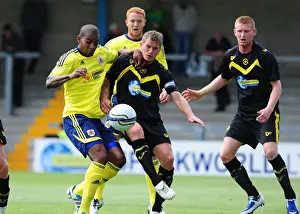 Torquay V Bristol City Prints: Bristol Citys Marvin Elliott battles for the ball with the Torquay defence