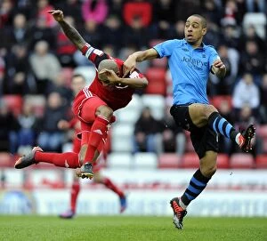 Images Dated 9th February 2013: Bristol City's Marvin Elliott Fouls by Dexter Blackstock during Championship Match
