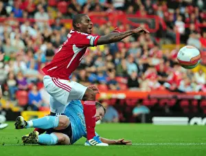 Bristol City V Hull City Prints: Bristol City's Marvin Elliott Fouls by Hull City's Paul McKenna in Championship Match