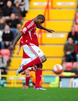 Images Dated 5th November 2011: Bristol City's Marvin Elliott Shoots in Championship Match Against Burnley - 05/11/2011