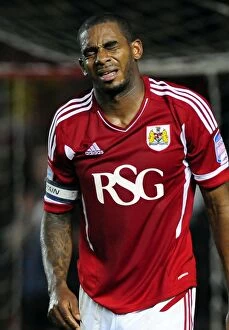 Images Dated 27th September 2011: Bristol City's Marvin Elliott Suffers Eye Injury During Championship Match Against Reading