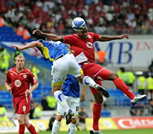 Bristol City`s Marvin Elliott wins this duel with Cardiff`s Mark Hudson