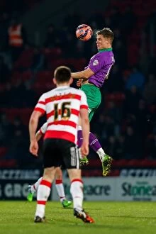 Images Dated 3rd January 2015: Bristol City's Matt Smith Scores Dramatic Header in FA Cup Third Round Proper: Doncaster Rovers vs