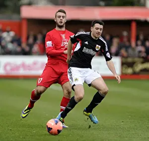 Bristol City's Moloney vs. Peniket: A Football Rivalry Flares Up in the FA Cup Second Round at The Lamb Ground