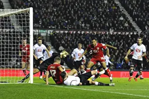 Derby County V Bristol City Prints: Bristol City's Nathan Baker Tries to Score in Derby County Showdown