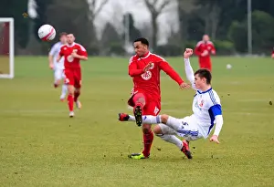 Bristol City Res V Swindon Res Prints: Bristol Citys Nicky Maynard battles for the ball with the Swindon Defence