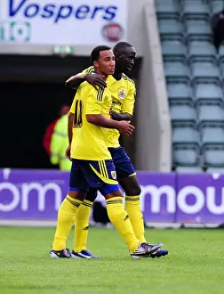 Plymouth Argyle V Bristol City Prints: Bristol Citys Nicky Maynard celebrates with Bristol Citys Albert Adomah