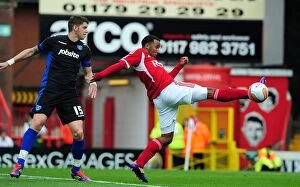 Bristol City v Portsmouth Collection: Bristol City's Nicky Maynard Outmuscles Portsmouth's Greg Halford in 2008-09 Championship Clash at