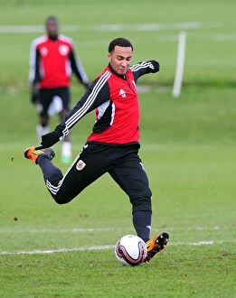 Training 12-1-12 Collection: Bristol City's Nicky Maynard: Unwavering Concentration on Football Excellence during Training