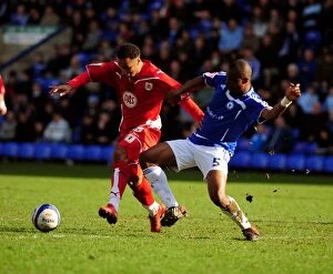 Images Dated 27th March 2010: Bristol City's Nicky Maynard vs. Peterborough's Gabriel Zakuani: A Championship Battle