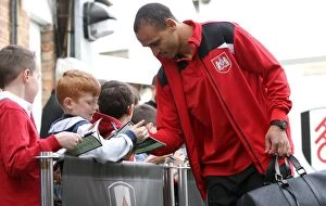 Images Dated 12th March 2016: Bristol City's Peter Odemwingie Signs Autographs at Craven Cottage after Fulham Match