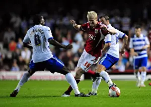 Bristol City V Reading Prints: Bristol City's Ryan McGivern Outmaneuvers Mikele Leigertwood and Noel Hunt of Reading in Championship Match