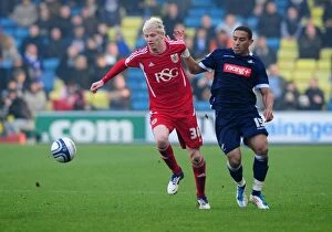 Millwall v Bristol City Collection: Bristol City's Ryan McGivern vs. Liam Feeney: Battle for the Ball in Millwall vs