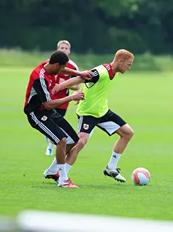 Pre-season Training Prints: Bristol Citys Ryan Taylor battles for the ball with Bristol Citys Lewin Nyatanga