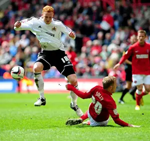 Bristol City's Ryan Taylor Dodges Chris Solly Challenge in Npower Championship Clash