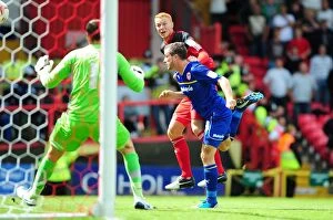 Images Dated 25th August 2012: Bristol City's Ryan Taylor Misses Header Against Cardiff City - Championship Football Match