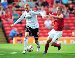 Barnsley V Bristol City Prints: Bristol City's Ryan Taylor vs Barnsley's Stephen Dawson - Championship Clash at Oakwell Stadium