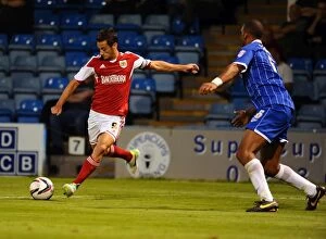 Images Dated 6th August 2013: Bristol City's Sam Baldock Attempts Cross Against Gillingham in Capital One Cup Clash