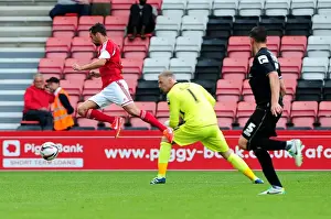 Bournemouth V Bristol City Prints: Bristol City's Sam Baldock Challenges Bournemouth's Ryan Allsop in Pre-Season Clash