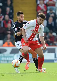 Stevenage V Bristol City Prints: Bristol City's Sam Baldock Challenges Stevenage's Sam Wedgbury in Sky Bet League One Clash