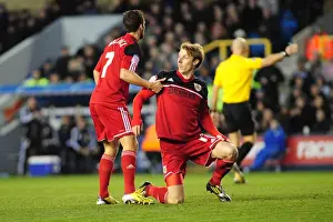 Bristol City's Sam Baldock Consoles Teammate Martyn Woolford After Tackle during Millwall vs Bristol City Championship Match