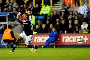 Images Dated 1st January 2013: Bristol City's Sam Baldock Fires from Distance in Championship Clash vs. Millwall