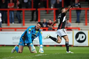 Stevenage V Bristol City Prints: Bristol City's Sam Baldock Rejoices as Stevenage's Chris Day Disappointed