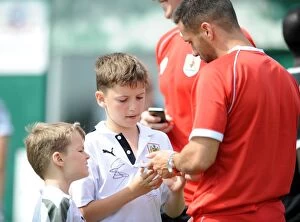 Images Dated 5th July 2014: Bristol City's Sam Baldock Signs Autographs at Portishead Town Pre-Season Friendly