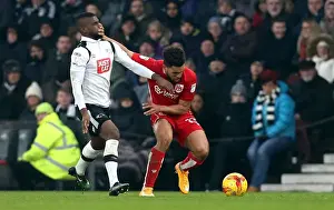 Derby County V Bristol City Prints: Bristol City's Scott Golbourne Fends Off Abdoul Camara in Derby County Clash