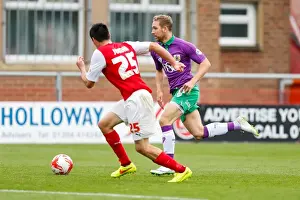 Framed Print : Bristol City's Scott Wagstaff Faces Off Against Fleetwood Town's Stephen Jordan in Sky Bet League 1 Clash Framed Print : Bristol City's Scott Wagstaff Faces Off Against Fleetwood Town's Stephen Jordan in Sky Bet League 1 Clash